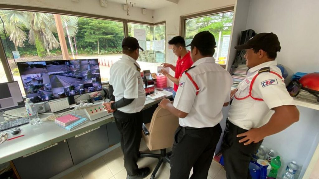 Mens working together in a GPS head unit